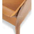 Orange saddle leather Cab dining chairs